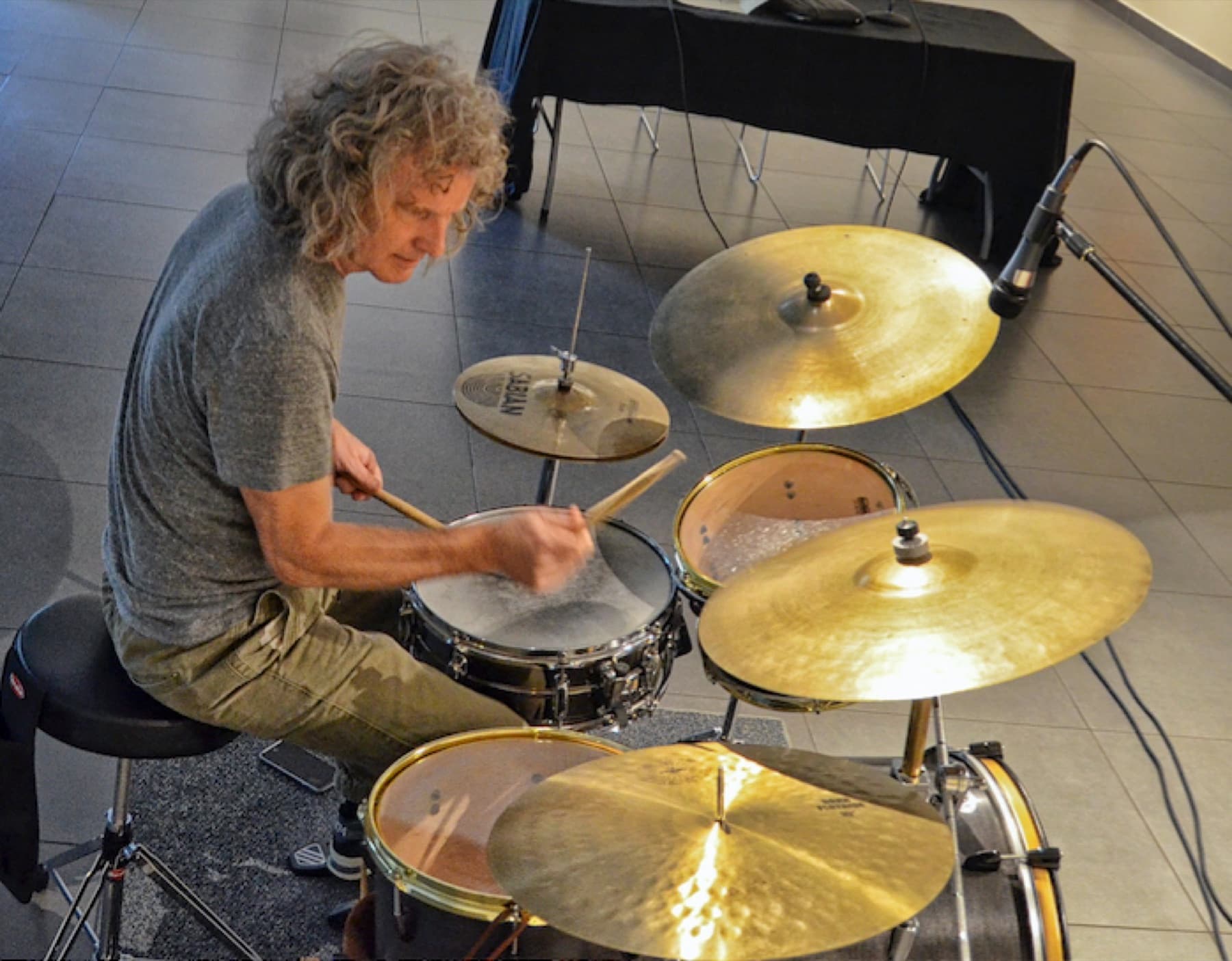 Steve Rucker playing an outdoor drum kit