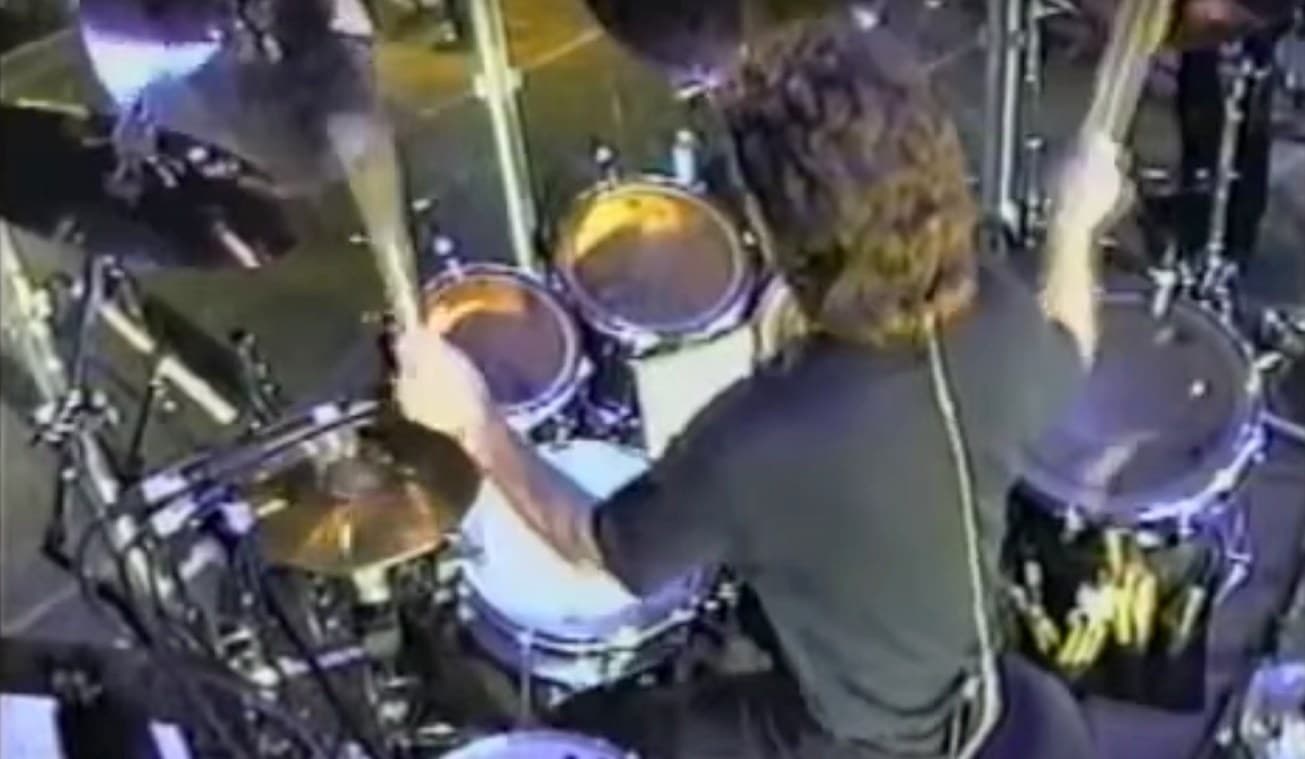 Steve Rucker mid-fill at the drum kit, Sydney 1999