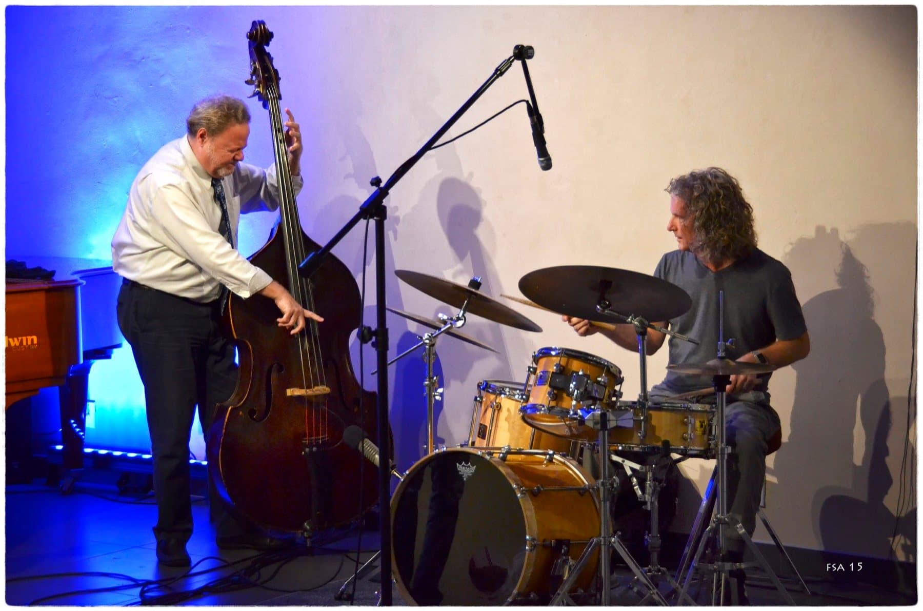 Steve Rucker at the drums with an upright bassist, WDNA 2015