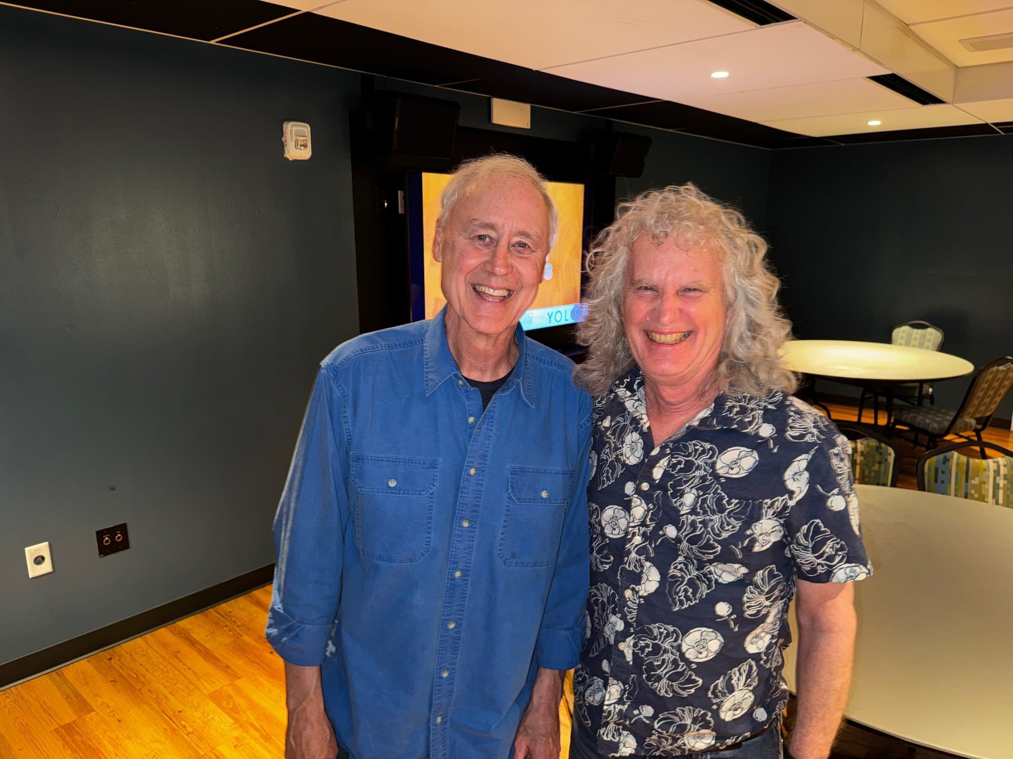 Bruce Hornsby (left) and Steve Rucker smiling side by side